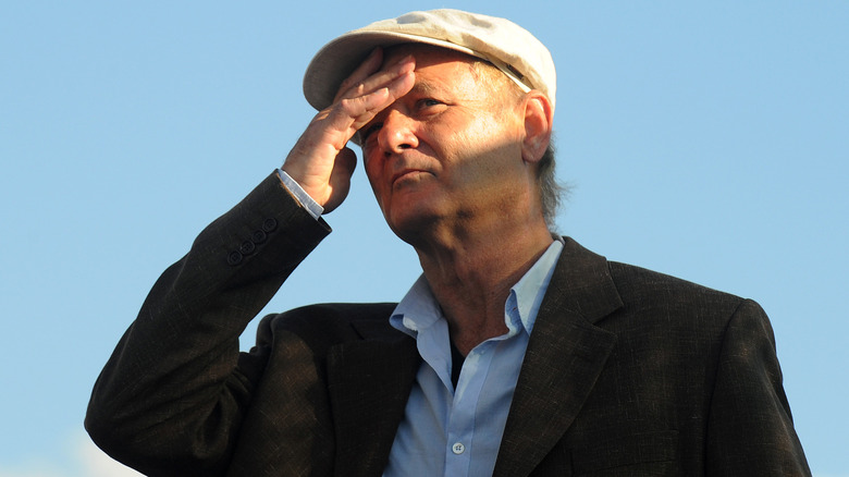 Bill Murray shielding eyes