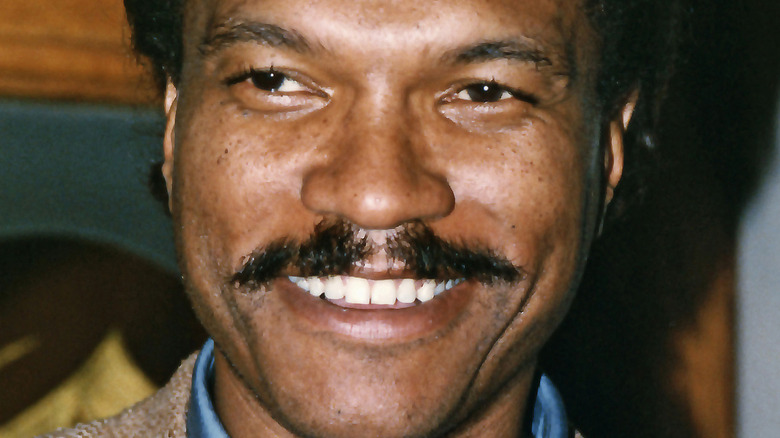 Young Billy Dee Williams smiles