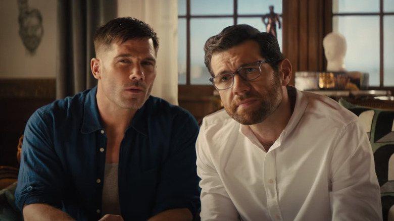 Billy Eichner and Luke Macfarlane looking skeptical