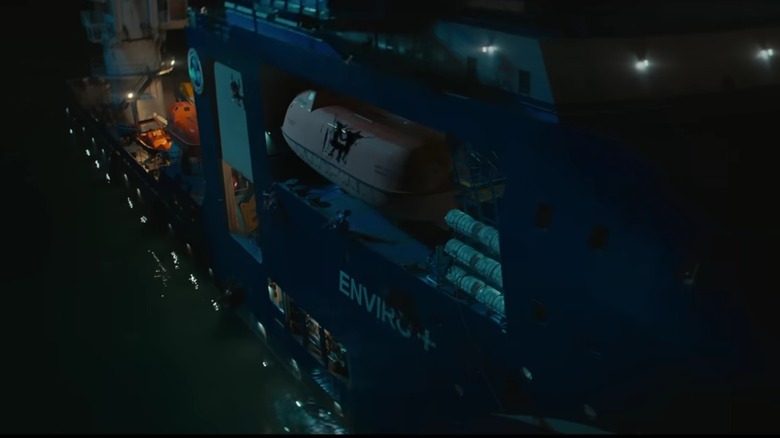 Wakandans crawling on the outside of an ocean liner in Black Panther: Wakanda Forever