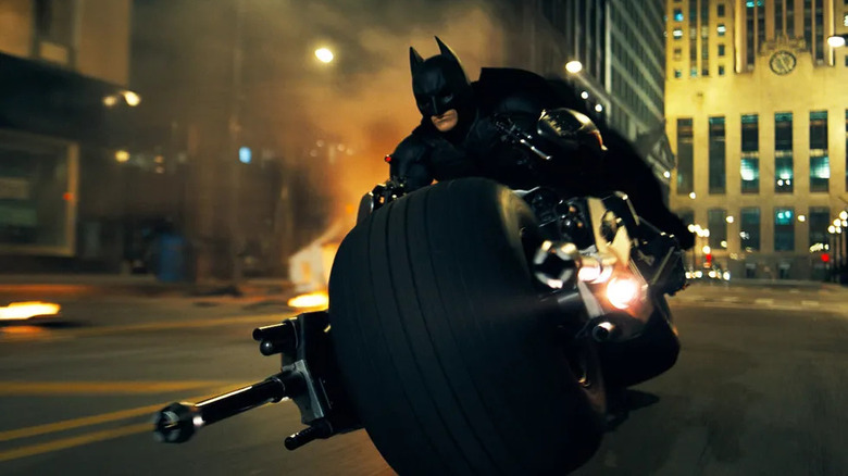 Batman driving the Batpod