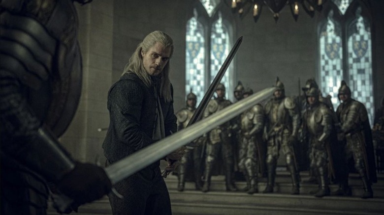 Geralt of Rivia holding a sword