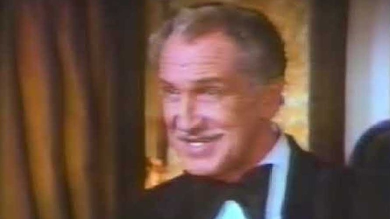 Vincent Price smiles