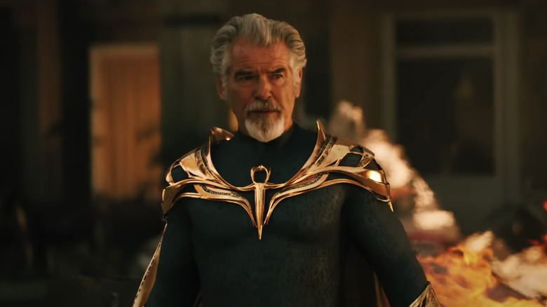 Pierce Brosnan as Doctor Fate standing in his costume