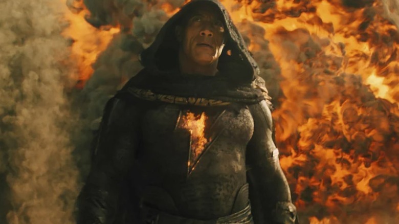 Black Adam standing in the flames