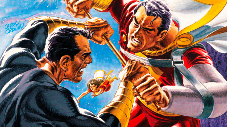 Black Adam and Captain Marvel wrestle 