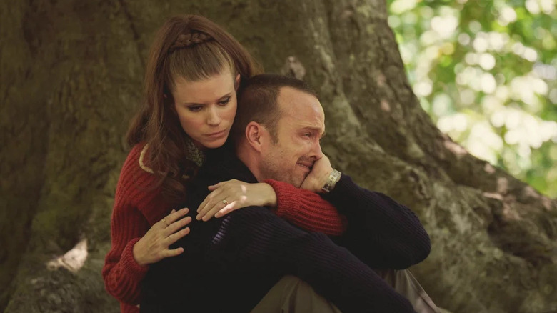 Lana hugging Cliff near tree