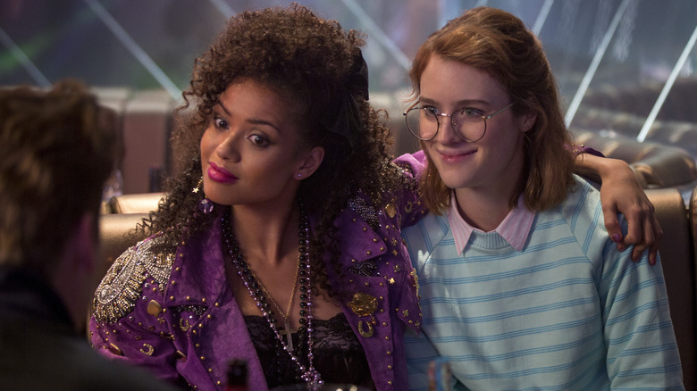 Yorkie and Kelly seated in San Junipero