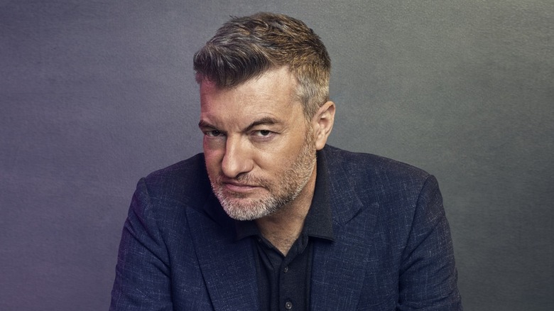 Charlie Brooker smirking