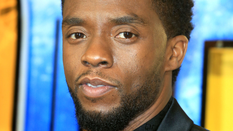 Chadwick Boseman looking into camera