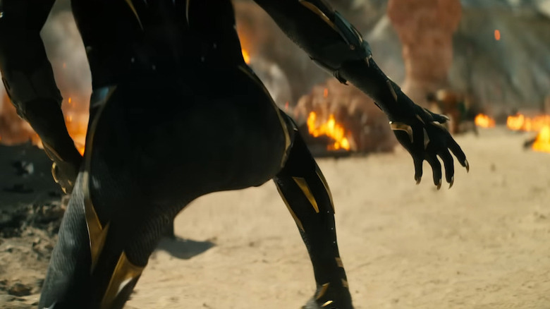 Unknown Black Panther with gold gauntlets and claws
