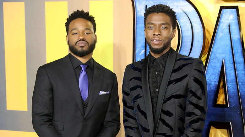 Coogler and Boseman pose at event 