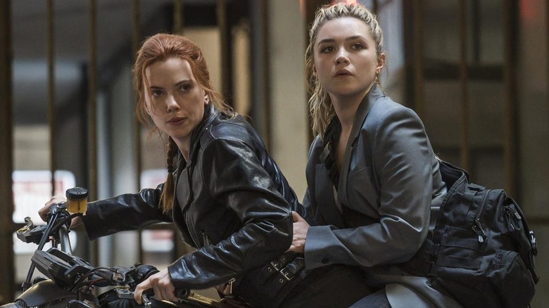 Natasha Romanoff and Yelena Belova on a motorcycle