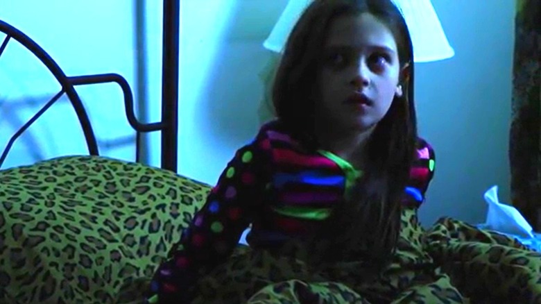 Caroline sitting up in bed 