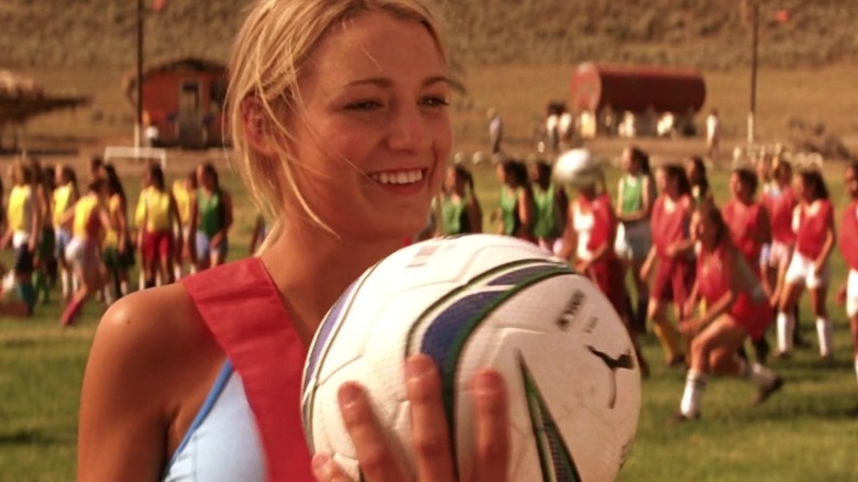 Bridget playing soccer smiling