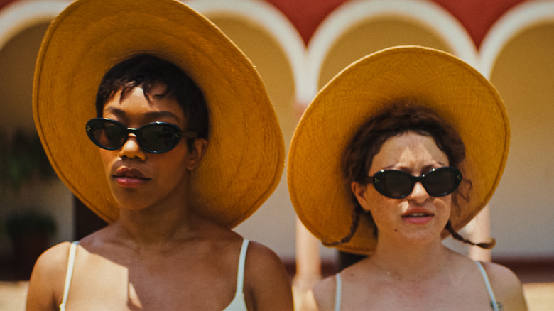 Frida and Jess wearing hats