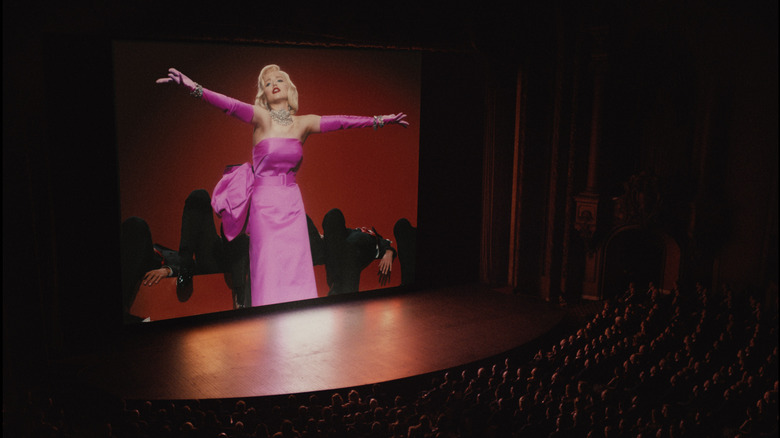 Marilyn Monroe in a pink dress on the big screen