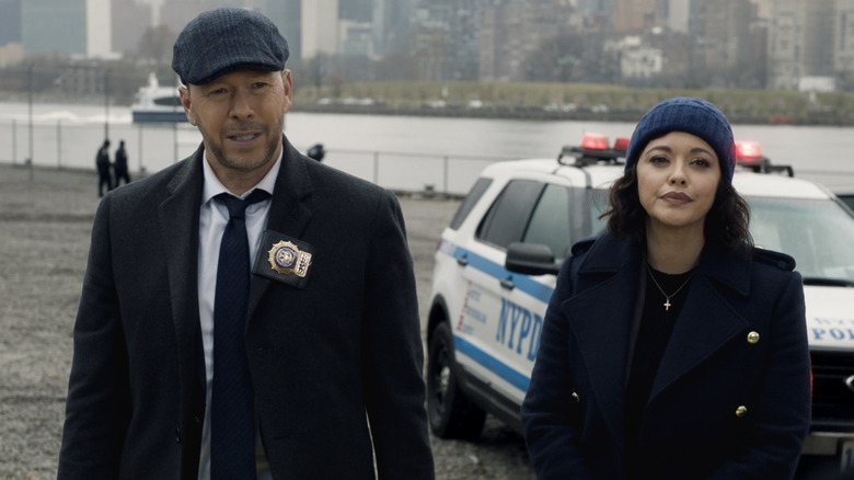 Maria Baez and Danny Reagan talk to a suspect on "Blue Bloods"