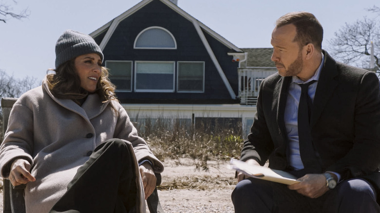 Jackie and Danny sitting in front of a barn