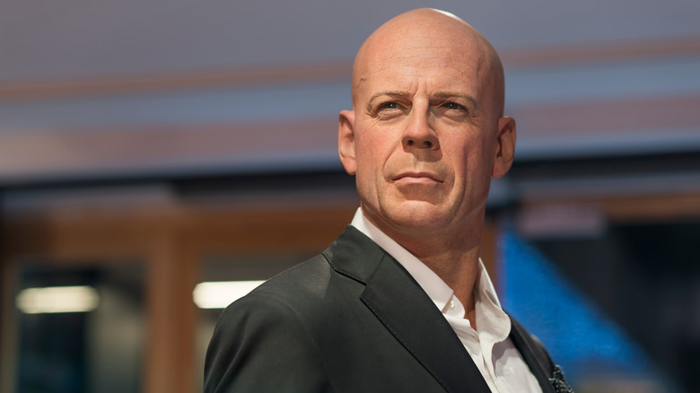 Bruce Willis in suit in screenshot