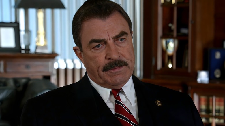 Tom Selleck furrows his eyebrows