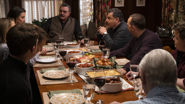 Anthony, Joe, and the Reagan family having dinner