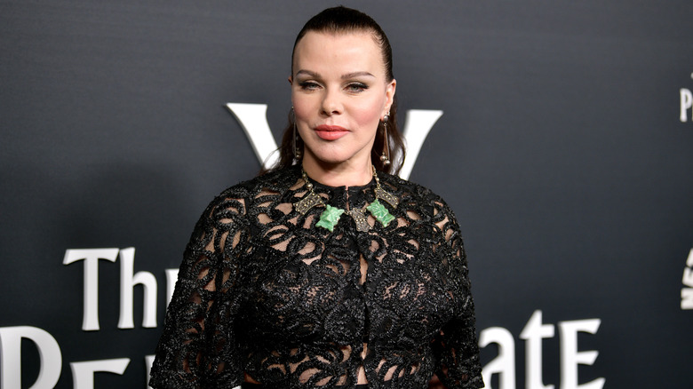 Debi Mazar smiling