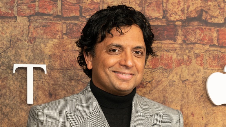 M. Night Shyamalan smiling