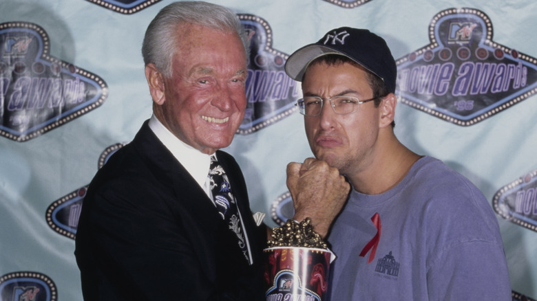 Bob Barker hitting Adam Sandler at event