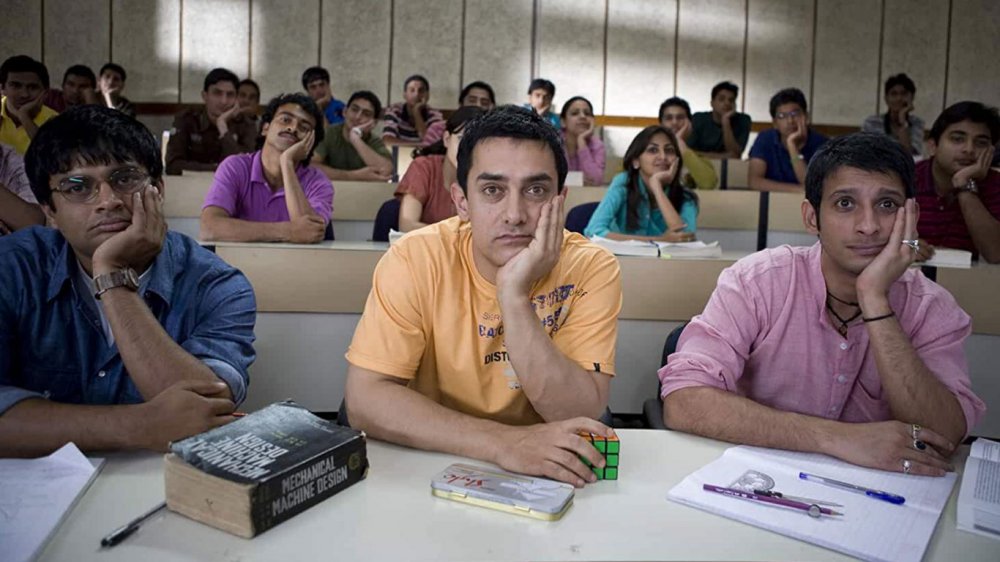 Aamir Khan as Rancho, Madhavan as Farhan Qureshi, and Sharman Joshi as Raju Rastogi in 3 Idiots