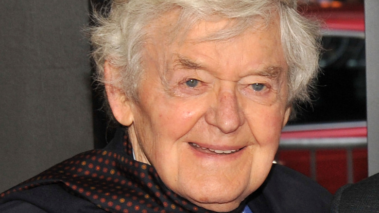 Hal Holbrook beams while wearing scarf