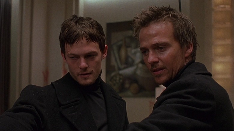 The Brothers MacManus aim guns