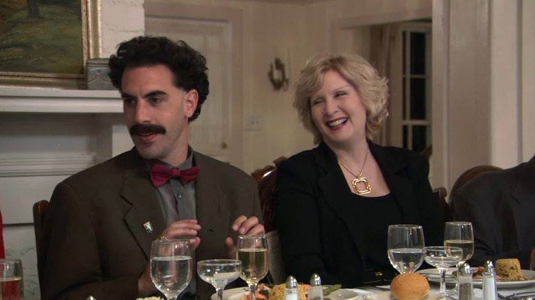 Borat sitting at dinner table