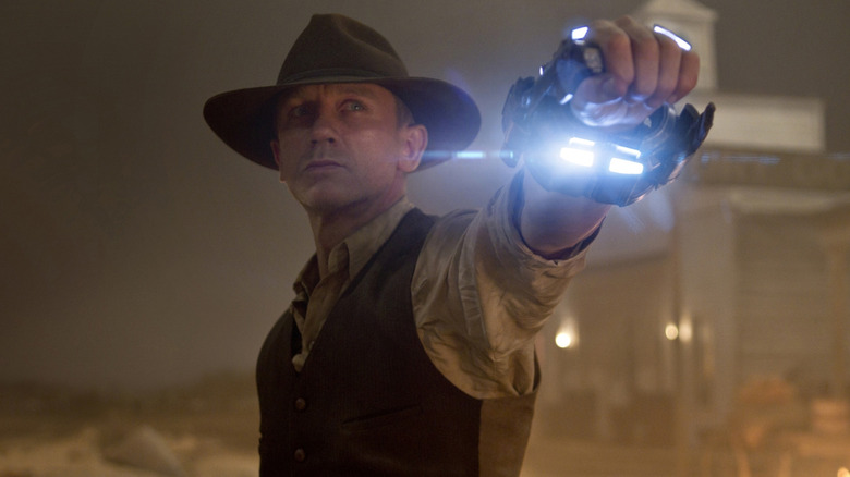 Lonergan points his weapon in "Cowboys and Aliens"