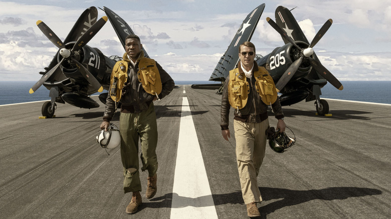 Brown and Hudner walk from their planes in "Devotion"