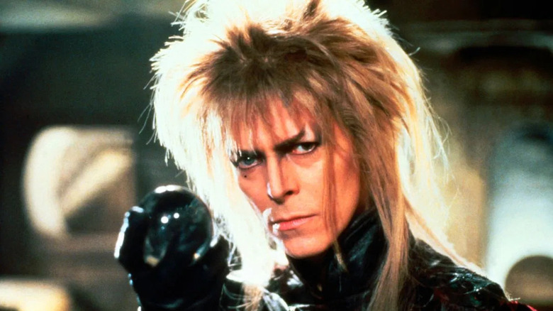 The Goblin King holds an orb in Labyrinth