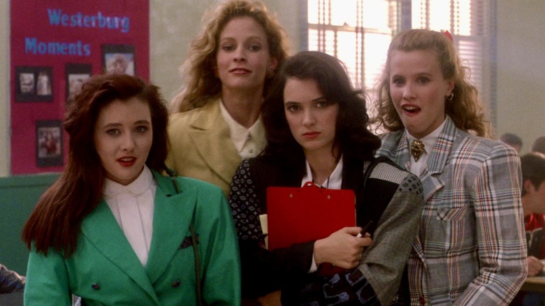 Veronica standing with the Heathers