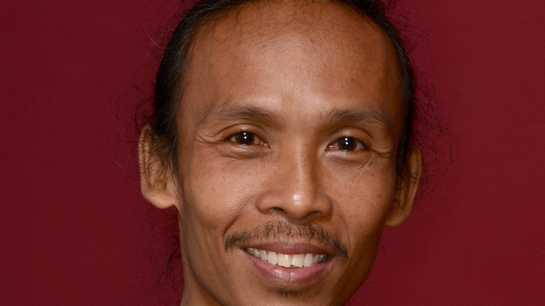 Yayan Ruhian smiling