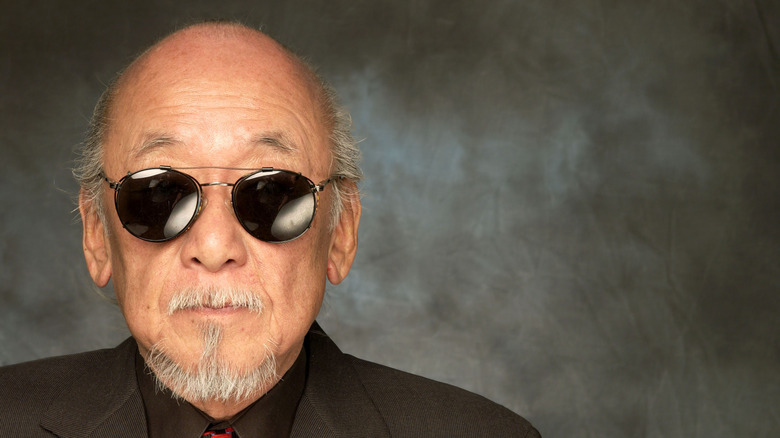 Pat Morita wearing sunglasses