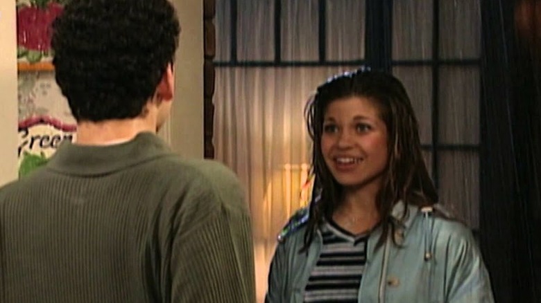 A soaked Topanga smiles at Cory