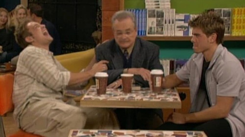 Eric, Feeny, and Jack sit with coffee