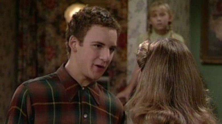 Cory looks down at Topanga