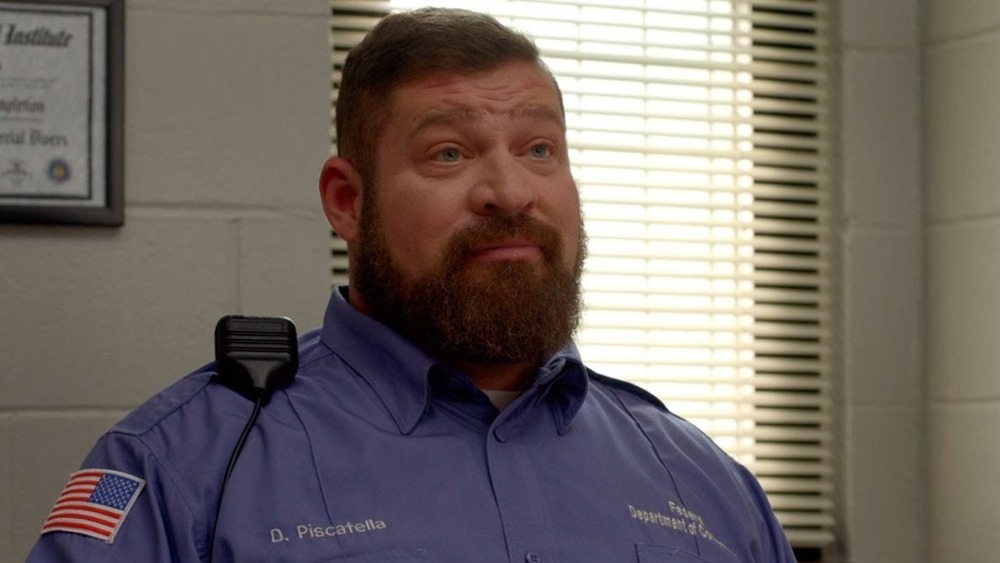 Henke as prison guard