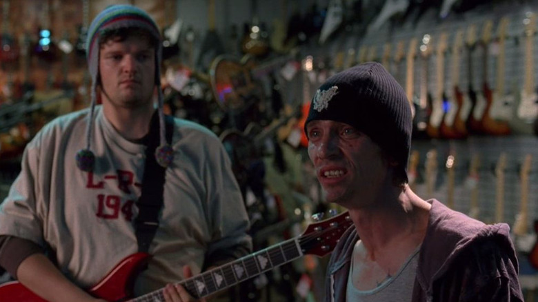 Badger and Skinny Pete in a music store