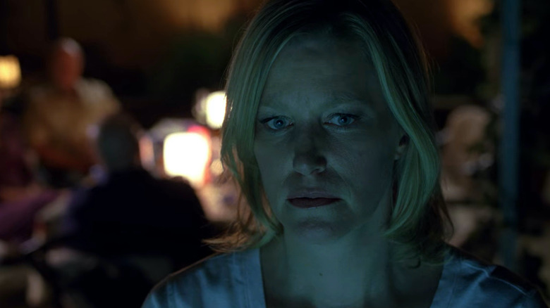 Skyler White lit by pool light