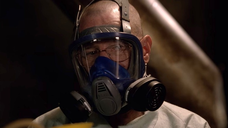 Walter White wearing a gas mask