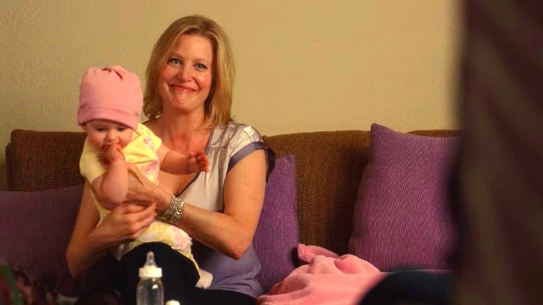 Skyler White smiling with baby Holly