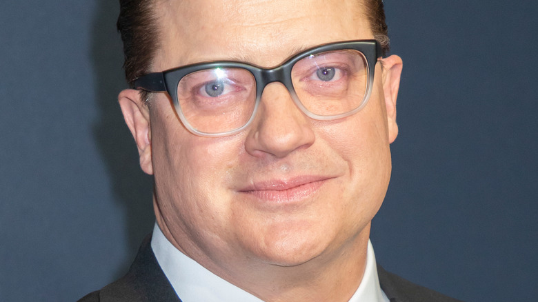 Brendan Fraser smiling with glasses on