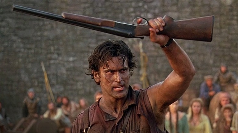 Bruce Campbell holding his boomstick