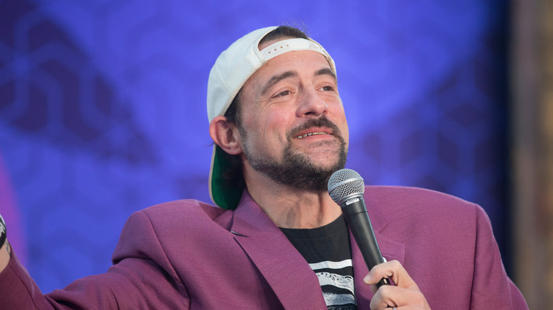 Kevin Smith in jacket and cap